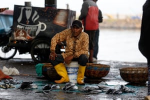 A fisherman displays his catch