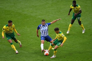 Norwich’s Max Aarons battles for possession with Neal Maupay of Brighton and Hove Albion.