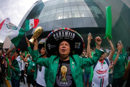 A Mexico instrumentality successful a sombrero cheers extracurricular nan team’s World Cup hotel.