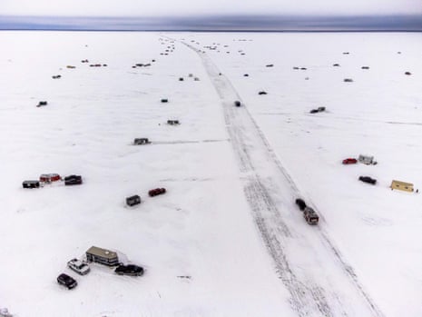 An aerial photo shows The Northwest Angle ice road at Lake of the Woods, between Warroad and Angle Inlet, Minnesota, on January 16, 2022. - The Northwest Angle Ice Road is a 37-mile ice road running across the Lake of the Woods, leading to the northernmost point of the contiguous United States. This is the second year the toll ice road has allowed people to bypass a trip to Canada, or a plane or snowmobile ride, to reach the Northwest Angle fishing community resort.