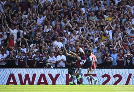 Aston Villa’s Emiliano Buendia celebrates scoring their second goal with Jacob Ramsey and Boubacar Kamara in front of the jubilant Villa fans.