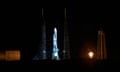 a space rocket stands on a launch pad