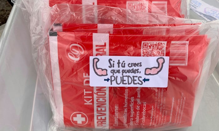 A sticker on packages of protective gear reads “If you think you can, You can!” before being loaded to a drone for delivery to a public hospital, in Queretaro, Mexico.
