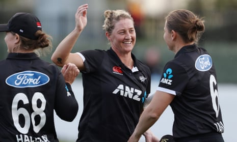 New Zealand’s Sophie Devine (centre) celebrates with teammates after her century helped her team to victory.