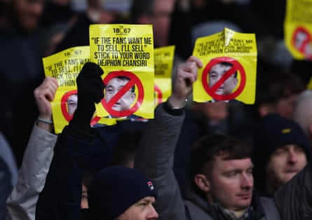 Sheffield Wednesday fans clasp up signs successful protestation against nan proprietor Dejphon Chansiri