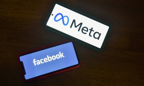 A pair of smartphones display the logos for Facebook and Meta.