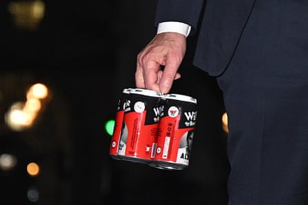 Anthony Albanese carries a four-pack of Willie the Boatman beer as he arrives for an informal meeting with the British prime minister at Number 10 Downing Street, 26 September 2025.