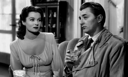 Fleming, left, with Robert Mitchum in Out of the Past