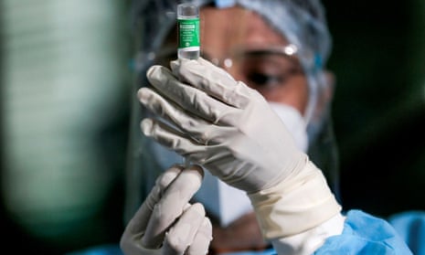 A health official draws a dose of Covid vaccine in Colombo, Sri Lanka