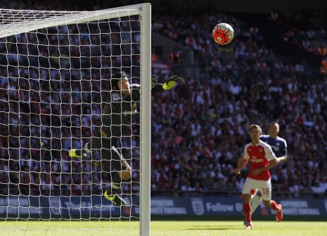 Petr Cech makes the save.
