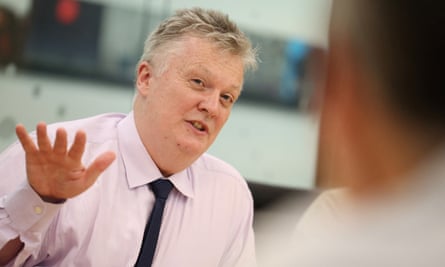 Huw Pill speaks to reporters