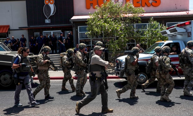 Law enforcement agencies respond to a shooting incident at a Walmart near Cielo Vista Mall in El Paso.