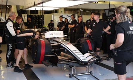 Mechanics work in the garage of the Cadillac driver Valtteri Bottas during F1 pre-season testing