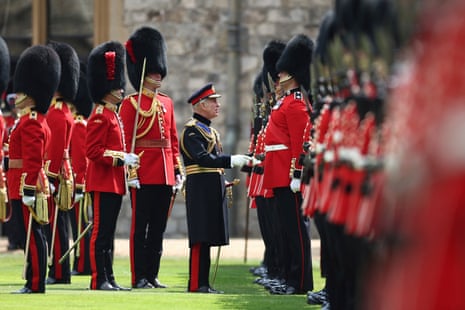 Britain’s King Charles III, Colonel in Chief of the Coldstream Guards, inspects the regiment last year at Windsor Castle.