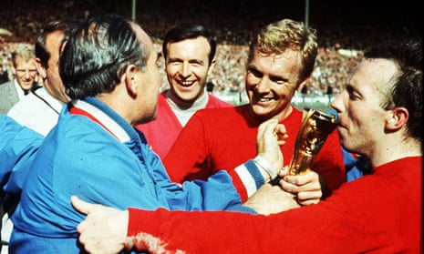 Nobby Stiles, right, kissing the Jules Rimet trophy after England’s World Cup victory in 1966, with Bobby Moore and Alf Ramsey.
