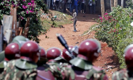 Anti-riot police attempt to disperse protesters in Kawangware slums in Nairobi, Kenya.