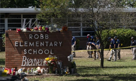 Investigators search for evidences outside Robb Elementary School in Uvalde, Texas, Wednesday, May 25, 2022. Desperation turned to heart-wrenching sorrow for families of grade schoolers killed after an 18-year-old gunman barricaded himself in their Texas classroom and began shooting, killing several fourth-graders and their teachers. (AP Photo/Jae C. Hong)