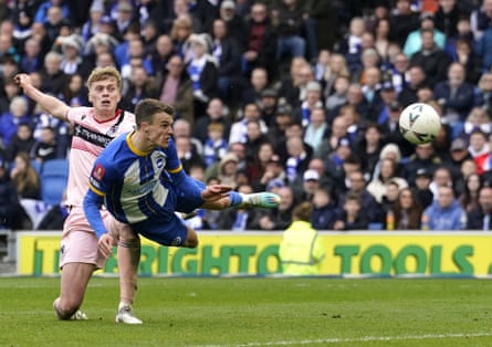 A flying Solly March heads home Brighton’s penultimate goal in their 5-0 FA Cup quarter-final victory over Grimsby in 2023.