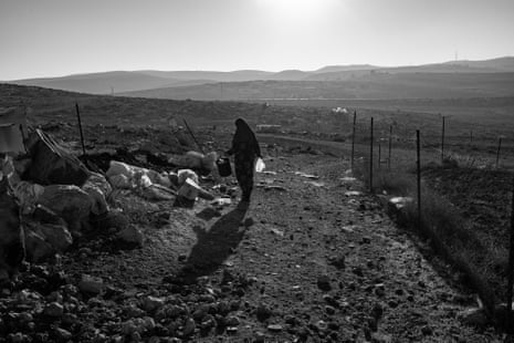 A woman in the early morning sun