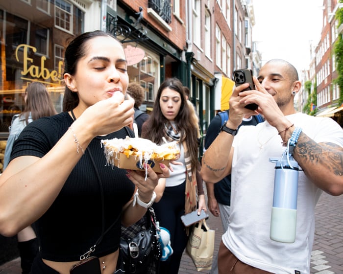 ‘We are in a kind of war’: row over viral Amsterdam chip shop lands in court