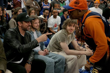 Aaron Rodgers, seen here chatting to Spike Lee at a Knicks game, has been making himself at home in New York