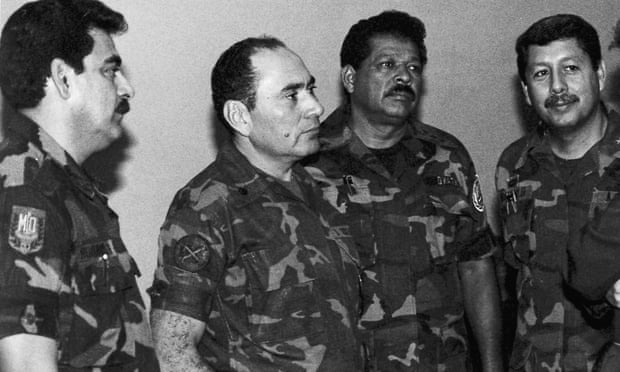 July 1989 photograph showing head of the joint chiefs of staff Colonel René Ponce (left), who died in 2011, and Col Inocente Orlando Montano (second from right), who is accused of being one of the crime’s ‘intellectual authors’.