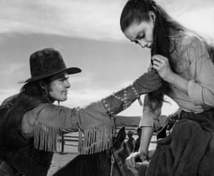 John Saxon as Native American Johnny Portugal and Audrey Hepburn as Rachel Zachary in The Unforgiven, 1960