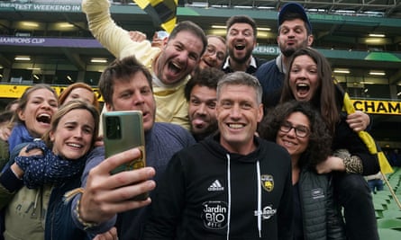 Ronan O'Gara celebrates with La Rochelle fans after his side retained the Champions Cup.