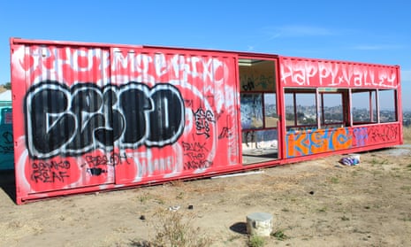 The windows are smashed, the walls are covered in graffiti, and the solar panels gone.