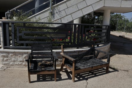 Burnt benches outside Maisoon Ali’s home