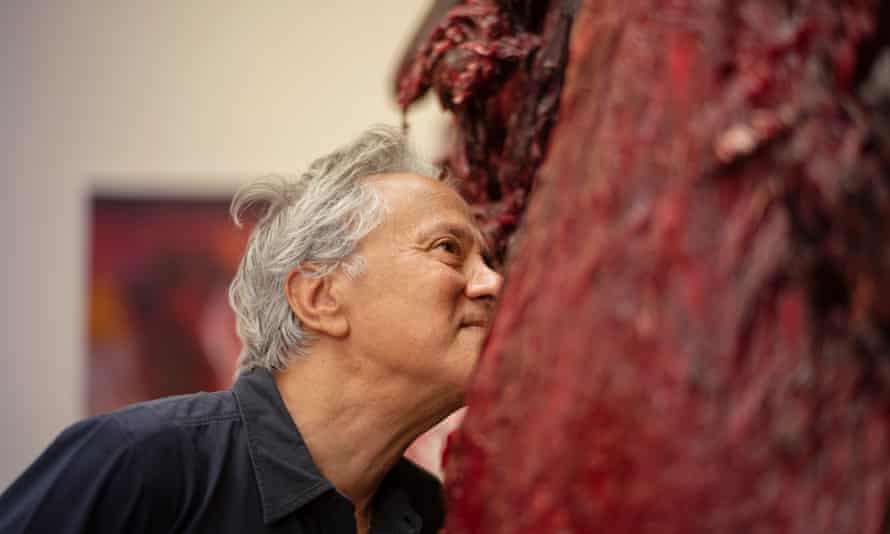 Leaning in … Kapoor with one of the exhibits for his show at Modern Art Oxford.