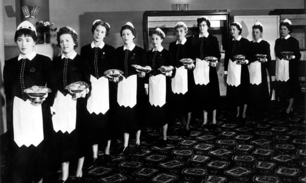 They also serve: a line of Nippies, Lyons Corner House waitresses, in 1930