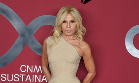 Donatella Versace poses for photographers as she arrives for the CNMI sustainable fashion awards in Milan, Italy, on Sunday.