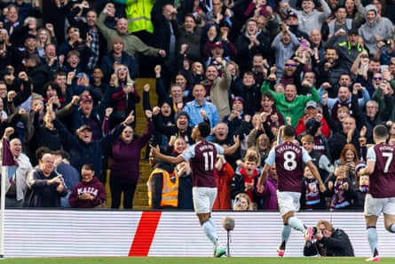 Ollie Watkins takes in the adulation of the Aston Villa fans after his first-minute goal.