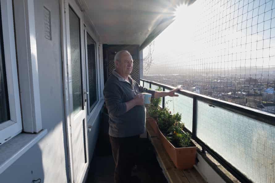 Resident Norman Cunningham on his 21st floor balcony