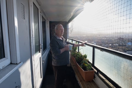 Resident Norman Cunningham on his 21st floor balcony