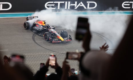 Max Verstappen of Red Bull Racing performs donuts after winning.
