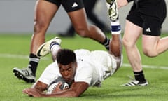 England's Immanuel Feyi-Waboso dives in for a try during Saturday’s second Test