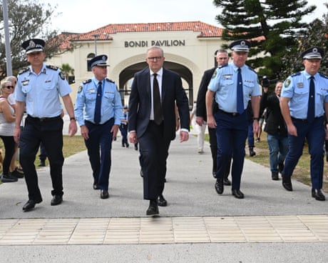 Anthony Albanese with police officers at the Bondi Pavilion