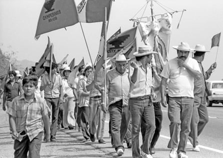 Labor activist Cesar Chavez leads the United Farm Worker’s on a march in California’s Central Valley, 1975.