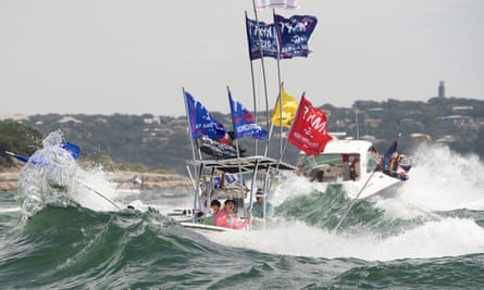 a pro-Trump boat is swamped by waves during a boat parade in Texas in September 2020.