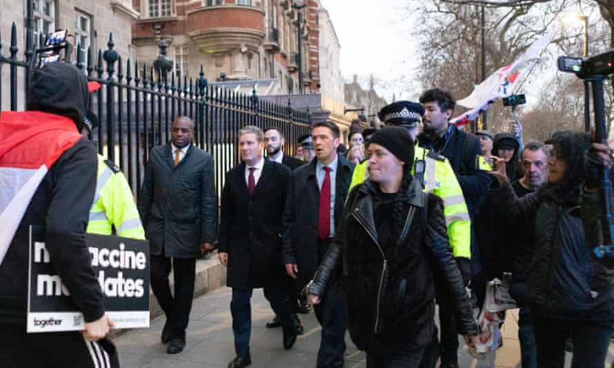Police rescue Keir Starmer after protesters surround him near parliament
