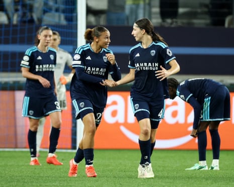 Paris FC's Maeline Mendy celebrates scoring their second goal with Kaja Korosec