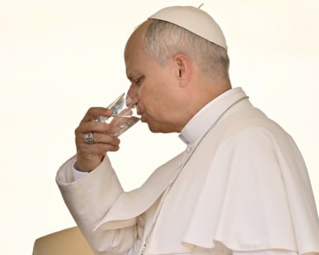 Pope Leo XIV drinks a glass of water at the end of the weekly general audience at St Peter's Square in The Vatican.