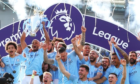 Manchester City players celebrate winning the 2019 Premier League.