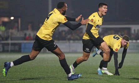 Bivesh Gurung celebrates with teammates after scoring Maidstone’s second goal against Barrow in the FA Cup second round.