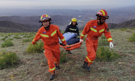 Rescuers search for missing runners after severe weather struck during a mountain race in Gansu, China.