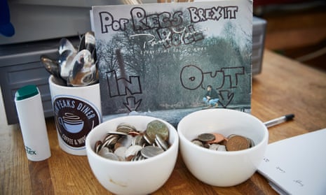 The Brexit in/out tips jars at Pop Recs cafe in Sunderland.