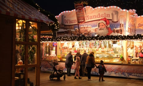 Visitors stroll among stalls at the annual Christmas market at Breitscheidplatz in Berlin in 2019