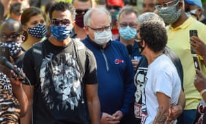 Minnesota governor Tim Walz (blue shirt) talks with protesters as they demonstrate against police brutality at the Governor’s Residence last week, over the death of George Floyd after being detained and had his neck knelt on by the Minneapolis police.